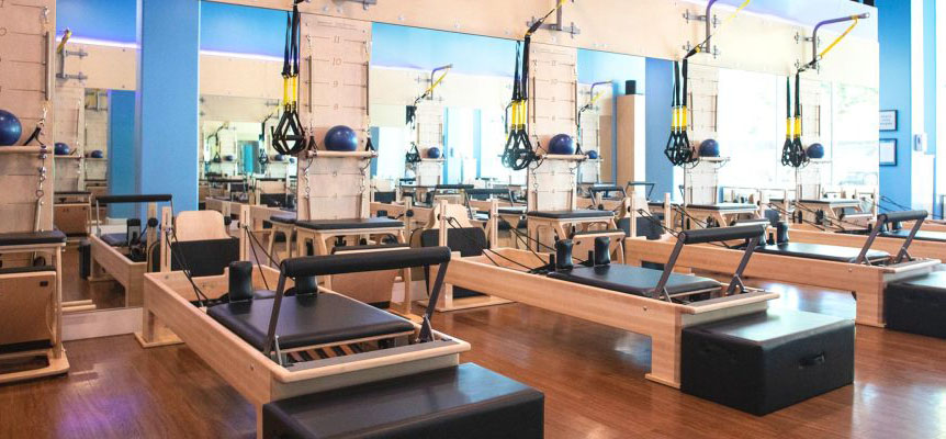 Club Pilates studio with reformers